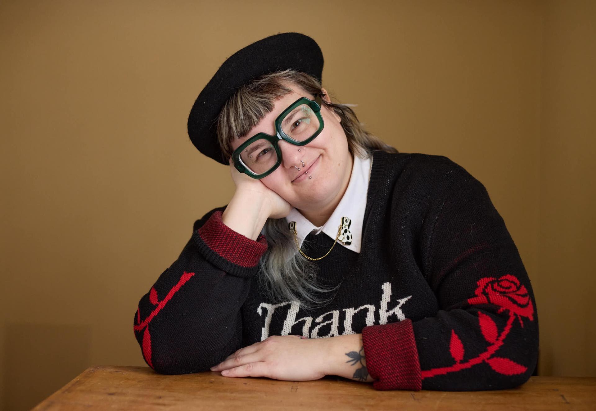 Relaxed creative portrait of a Ferndale professional resting her chin on her hand by Judy Babinski Photography