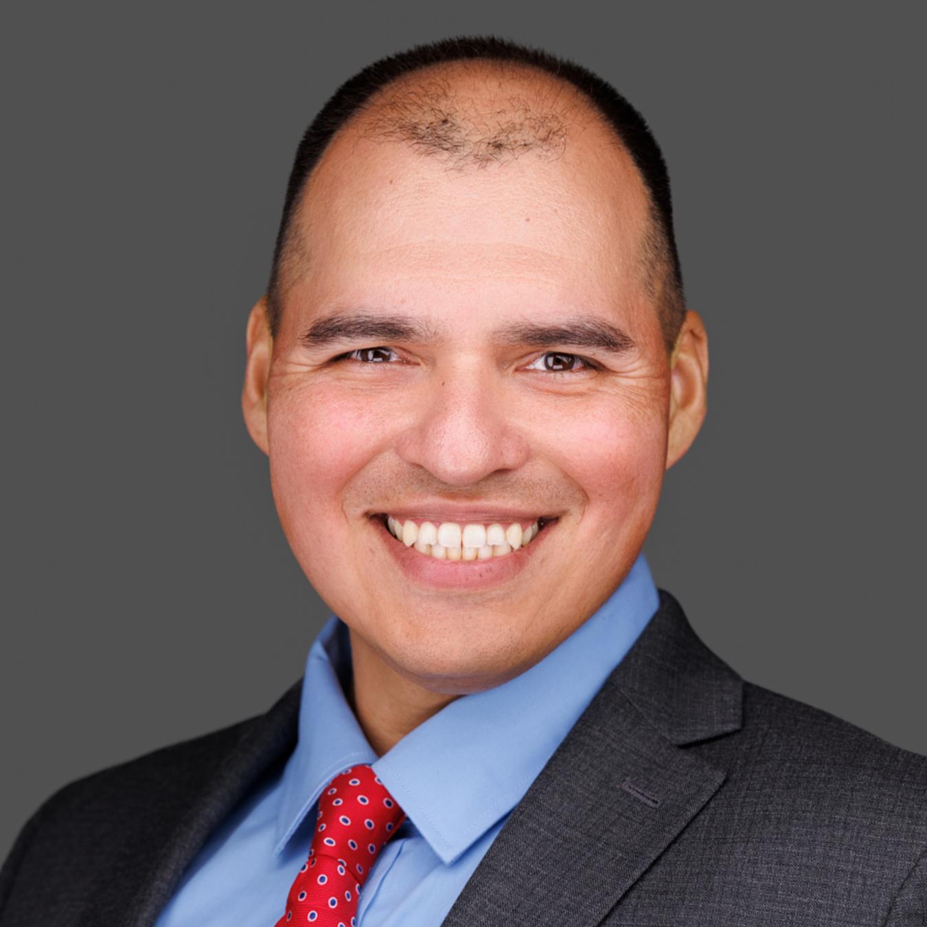 Business headshot of Justin for his Linkedin account
